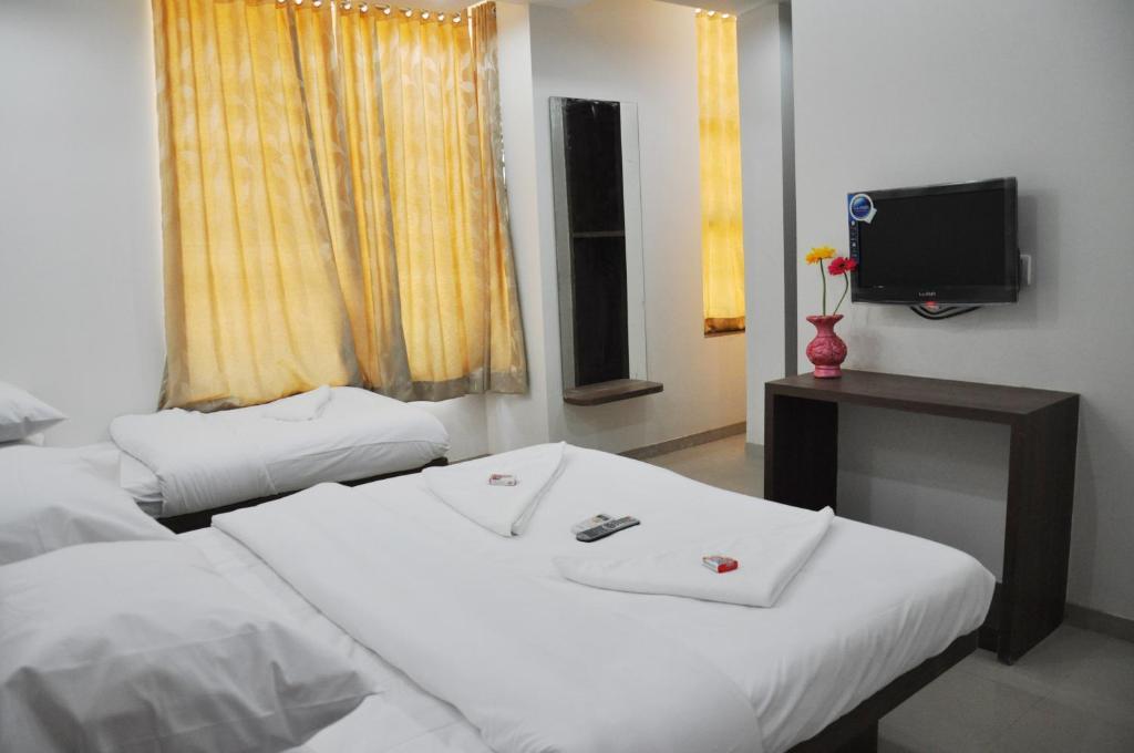 Sai Srushti Otel Shirdi Oda fotoğraf