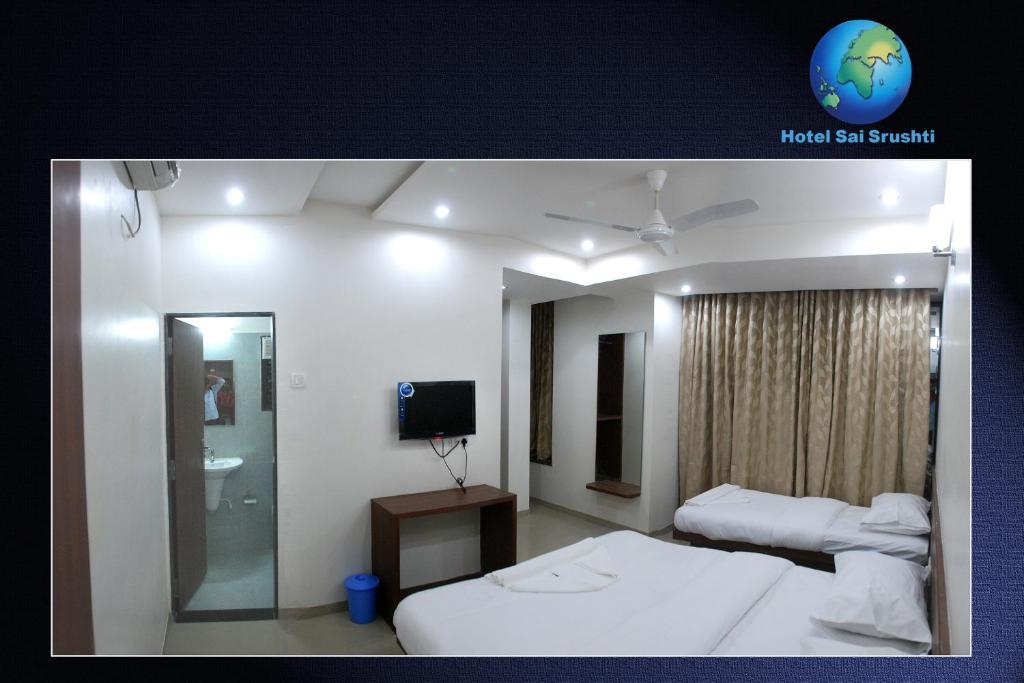 Sai Srushti Otel Shirdi Oda fotoğraf